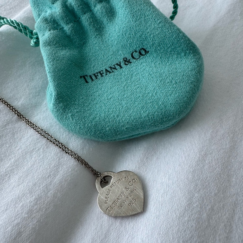 Tiffany & Co. Silver Heart Pendant with Teal Pouch
